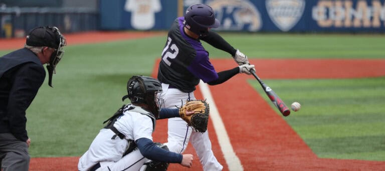 Baseball player at bat, hitting a ball. Catcher and umpire watching.