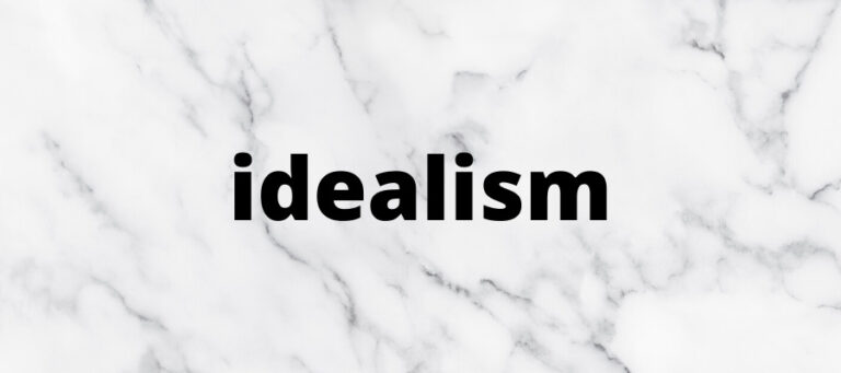 Idealism text on marble background