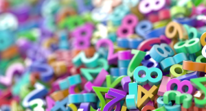 Colorful 3D numbers scattered haphazardly, showcasing variety and randomness