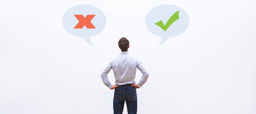 Man deciding between right and wrong, represented by checkmark and X symbols.
