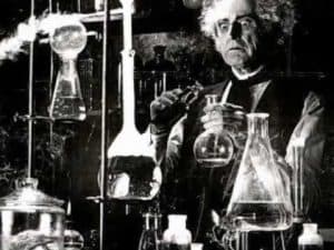 A 19th-century scientist conducts an experiment in his laboratory, surrounded by glassware and bubbling liquids. Experimental philosophy.