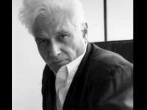 Black and white portrait of Jacques Derrida, a key figure in deconstruction.