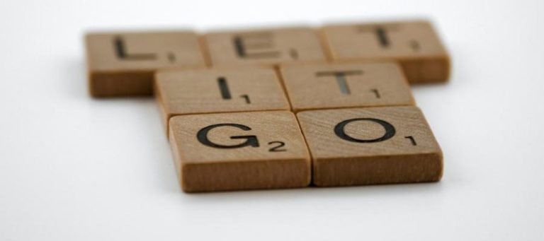 Scrabble tiles spelling "Let Go" – exploring nihilism and meaning.