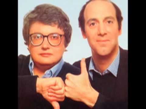Two men, one giving a thumbs-up, the other a thumbs-down, showing disagreement.