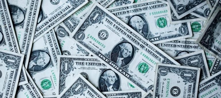 Pile of one dollar bills.