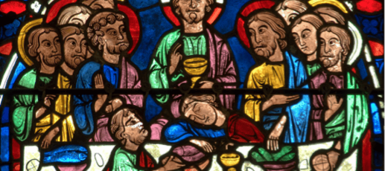 Stained glass depicting the Last Supper; Jesus and disciples