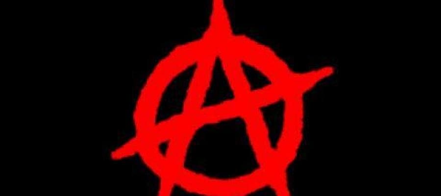 Red anarchy symbol on black background