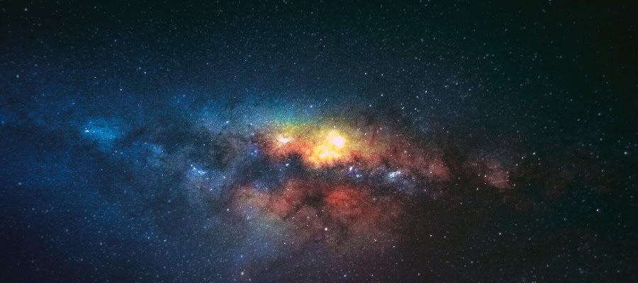 Vibrant nebula in deep space, showcasing a cosmic landscape of stars and gas clouds.