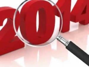 Magnifying glass over 2014; examining the year.
