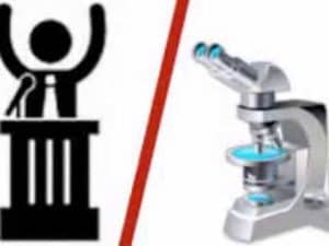 A speaker's podium and a microscope; science vs politics.