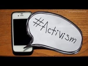 Smartphone with "#Activism" speech bubble; cyber-activism.