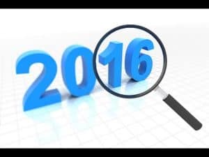 Magnifying glass focusing on 2016, examining the year.