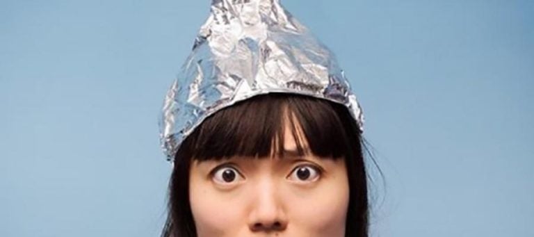 Woman wearing a tinfoil hat