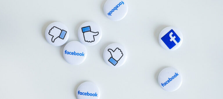 Facebook thumbs up and down buttons and logo on white background