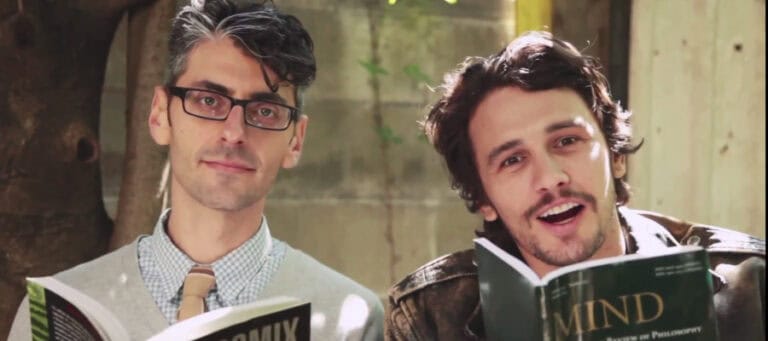 Two men reading books, discussing the future of work and automation.