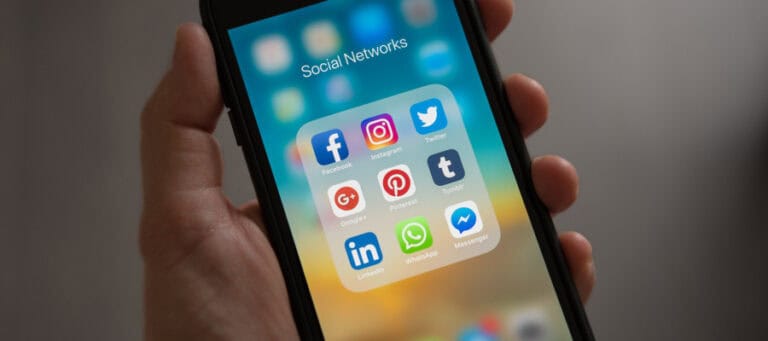 Smartphone displaying social media app icons.