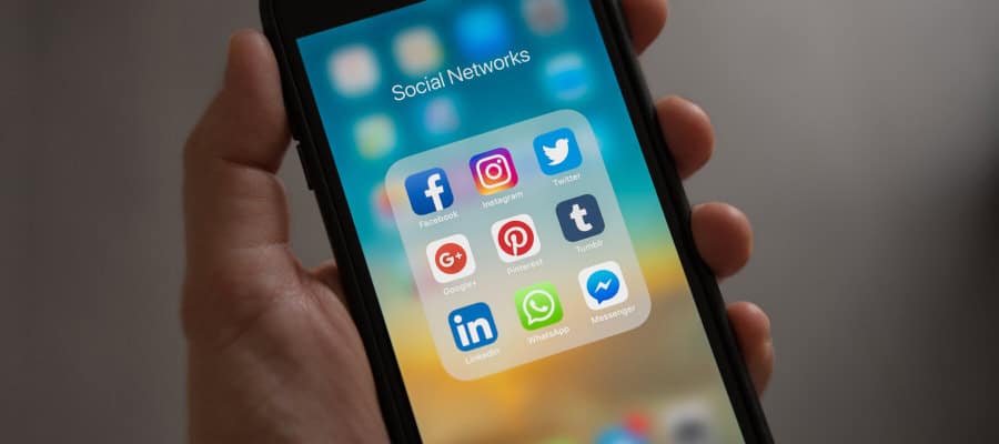 Smartphone displaying social media app icons.