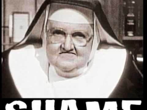 Stern-faced nun with the word "SHAME" below.