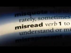 Dictionary definition of "misread," highlighting summer reading challenges.