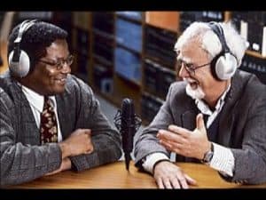 Two men in headsets discuss ethics during a radio broadcast. Is lying always bad?