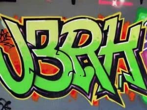 Vibrant graffiti art featuring the word "JBRN".