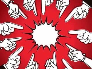 Many hands pointing accusingly at a central, blank space. Are we all to blame?