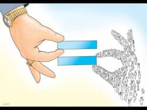 A large hand offers two unequal bars to a hand formed of many small figures, illustrating political inequality.