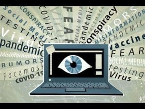 Laptop screen displays a watchful eye surrounded by words like "conspiracy," "pandemic," "fear," and "misinformation," reflecting the thinking of a conspiracy theorist.
