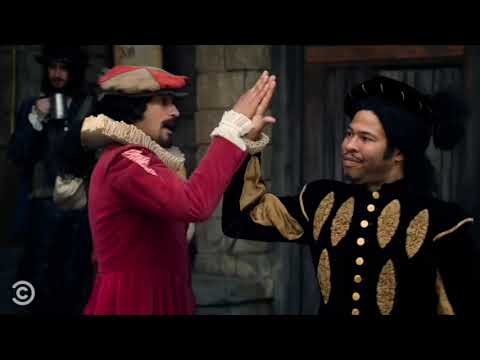 Two men in 16th-century attire give a high five. Shakespeare's outsiders.