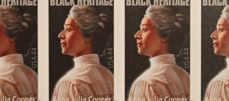 Close-up of four postage stamps featuring Anna Julia Cooper, a prominent figure in Black feminism.