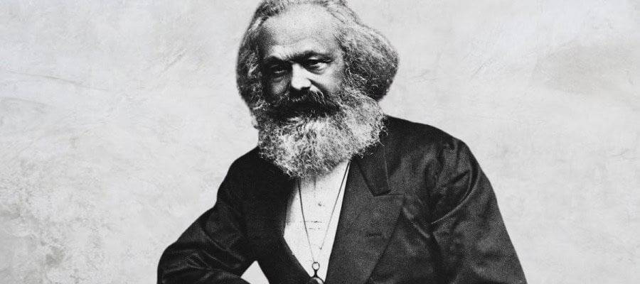 Black and white portrait of Karl Marx, philosopher and economist.