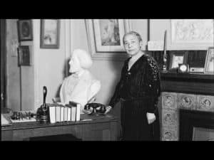 Anna Julia Cooper, prominent scholar and activist, stands in her study.