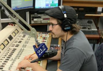 Radio DJ at work, broadcasting on 21.7 KAIW.