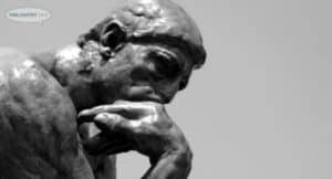 Close-up of Rodin's "The Thinker," contemplating the future of philosophy.
