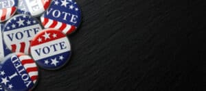 Vote buttons with red, white, and blue patriotic design.