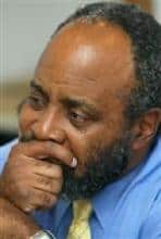 Close-up portrait of W.E.B. Du Bois, thoughtful expression.