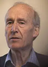 Portrait of an older man, contemplating the reality of time.