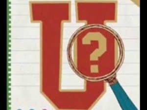 Magnifying glass over a large letter U, symbolizing the uncertainty of college admissions.