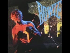 David Bowie album cover, Let's Dance, featuring Bowie shirtless in boxing stance.