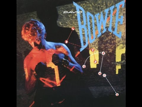 David Bowie album cover, Let's Dance, featuring Bowie shirtless in boxing stance.