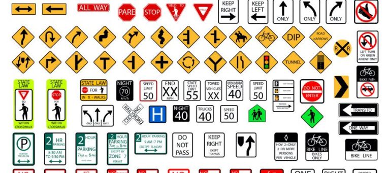 Collection of various road signs, including speed limits, directional arrows, and pedestrian crossing symbols.