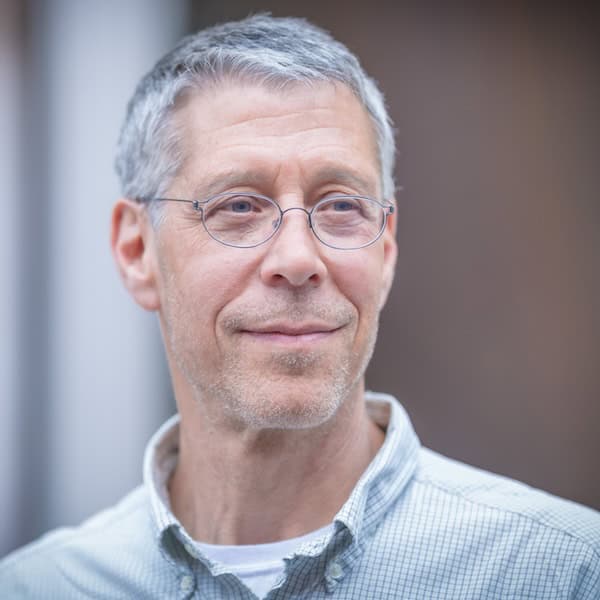 Portrait of a man with glasses, reminiscent of Baruch Spinoza